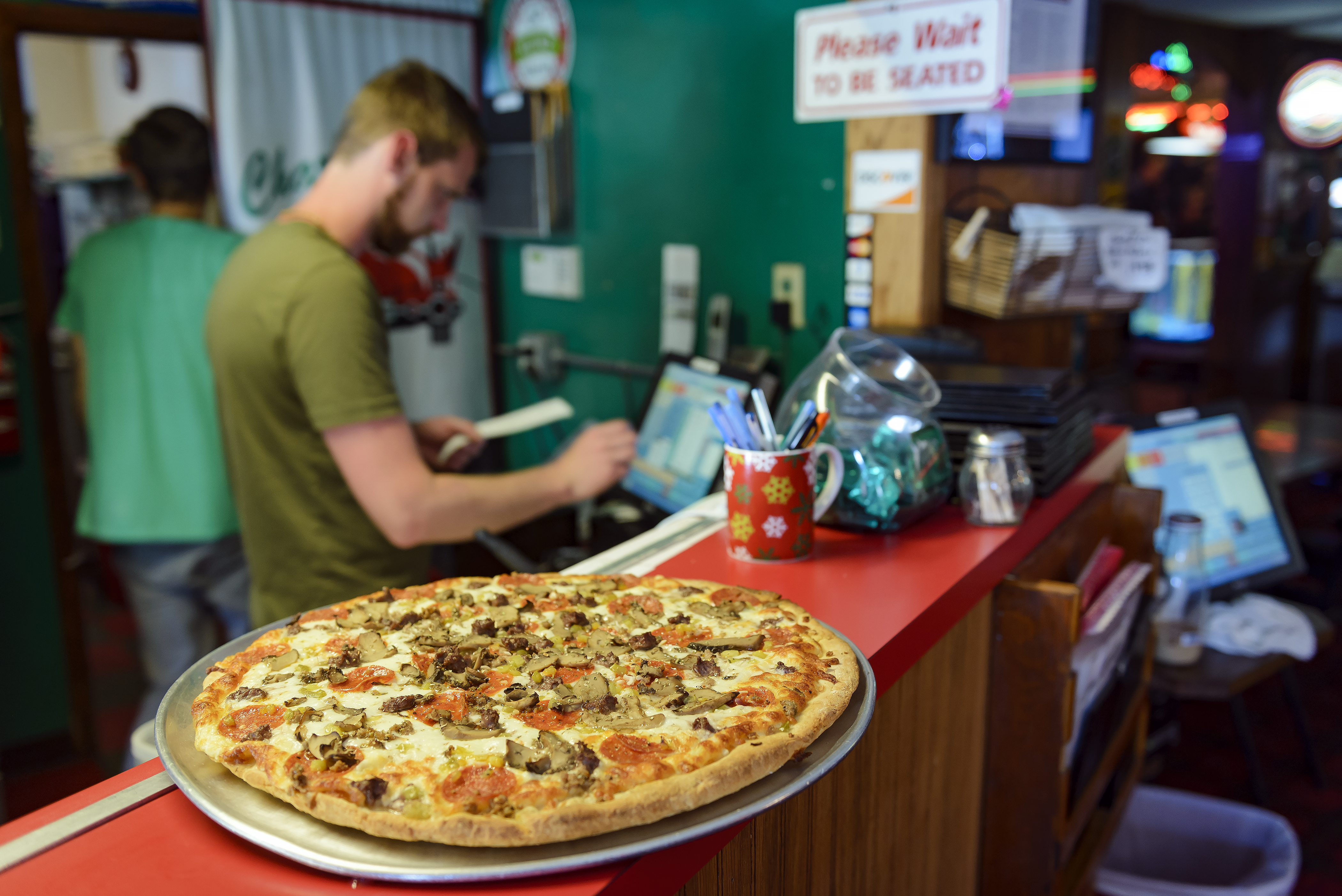 A pizza is ready to go at Charlie's Pizza in Yankton, South Dakota.