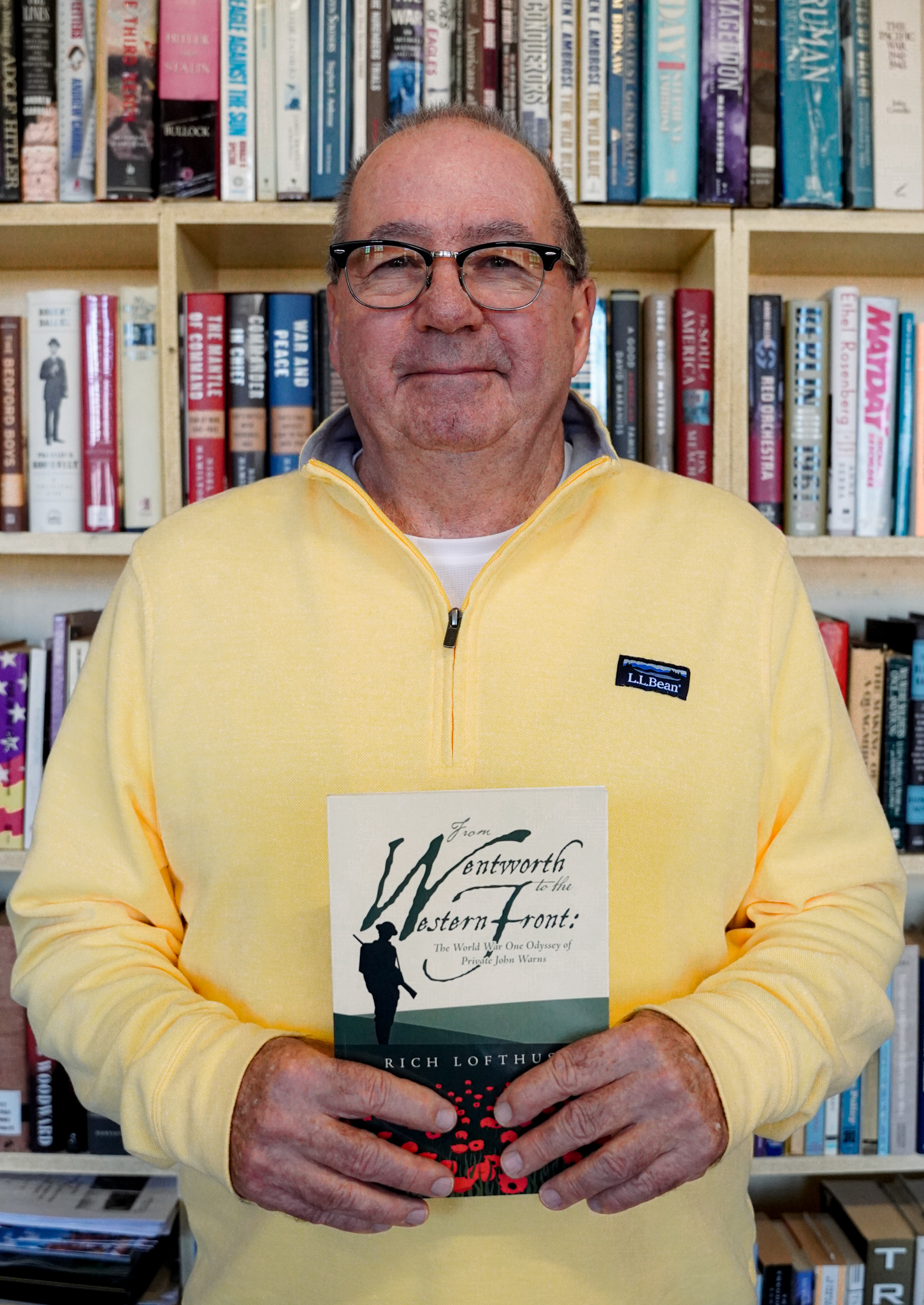 Dr. Rich Lofthus holding his book, From Wentworth to the Western Front